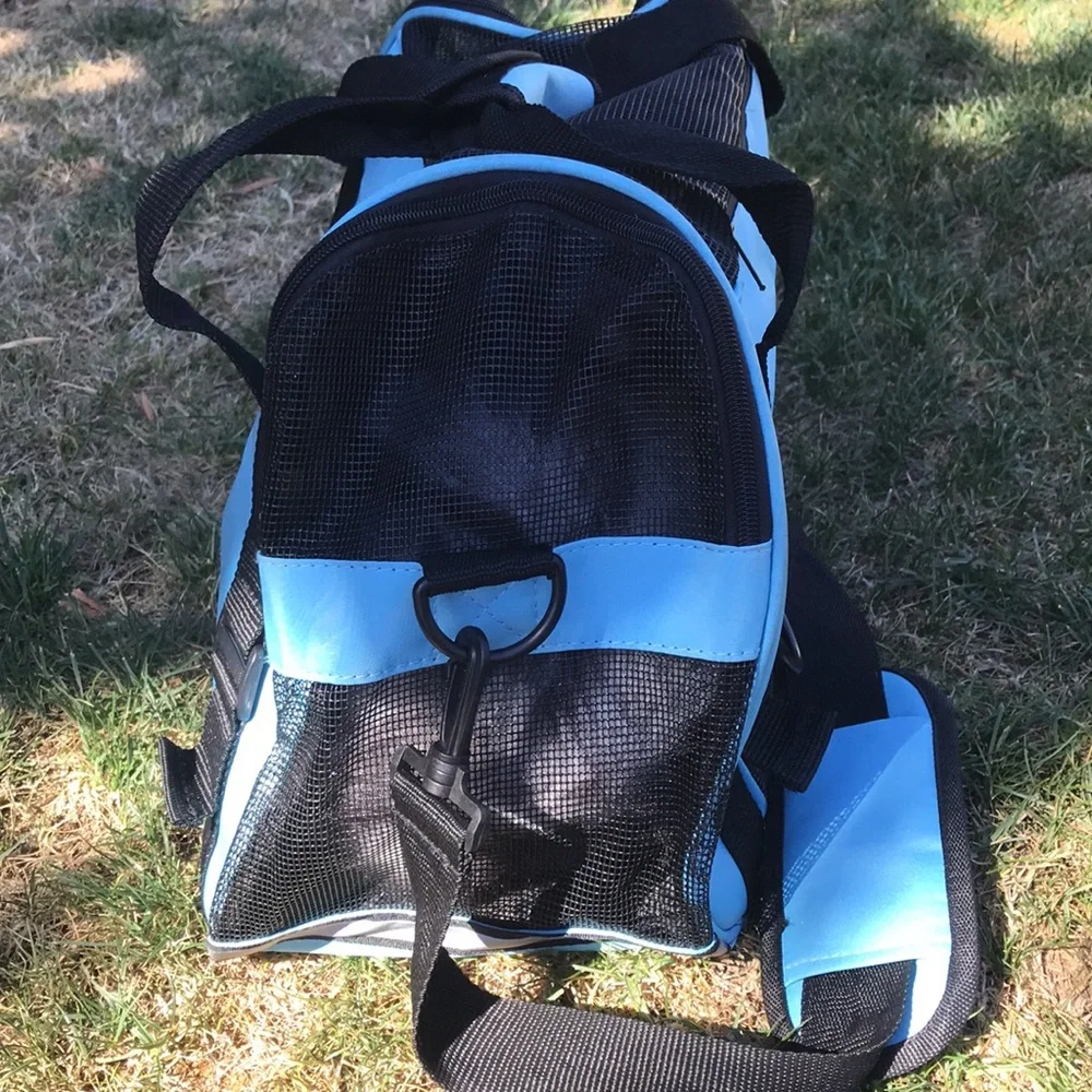 - Pet Carrier with shoulder strap light blue and black well vented used 1x